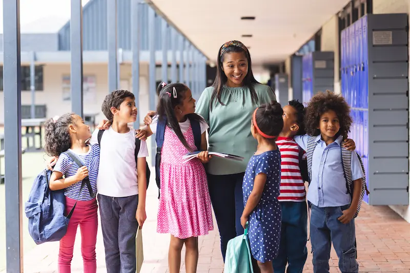 Students thank their teacher during National Support Public Education Day.